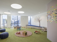 Thumbnail of The Ashland: 41P a room filled with furniture and grass