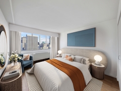 Thumbnail of Atlas New York: 39D a living room with a bed and a window