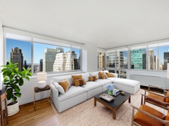 Thumbnail of Atlas New York: 44C a living room filled with furniture and a large window